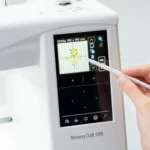 Janome Memory Craft 100E: Vollständige Bewertung der reinen Stickmaschine